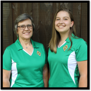 Two Honor Club members in Honor Club polos